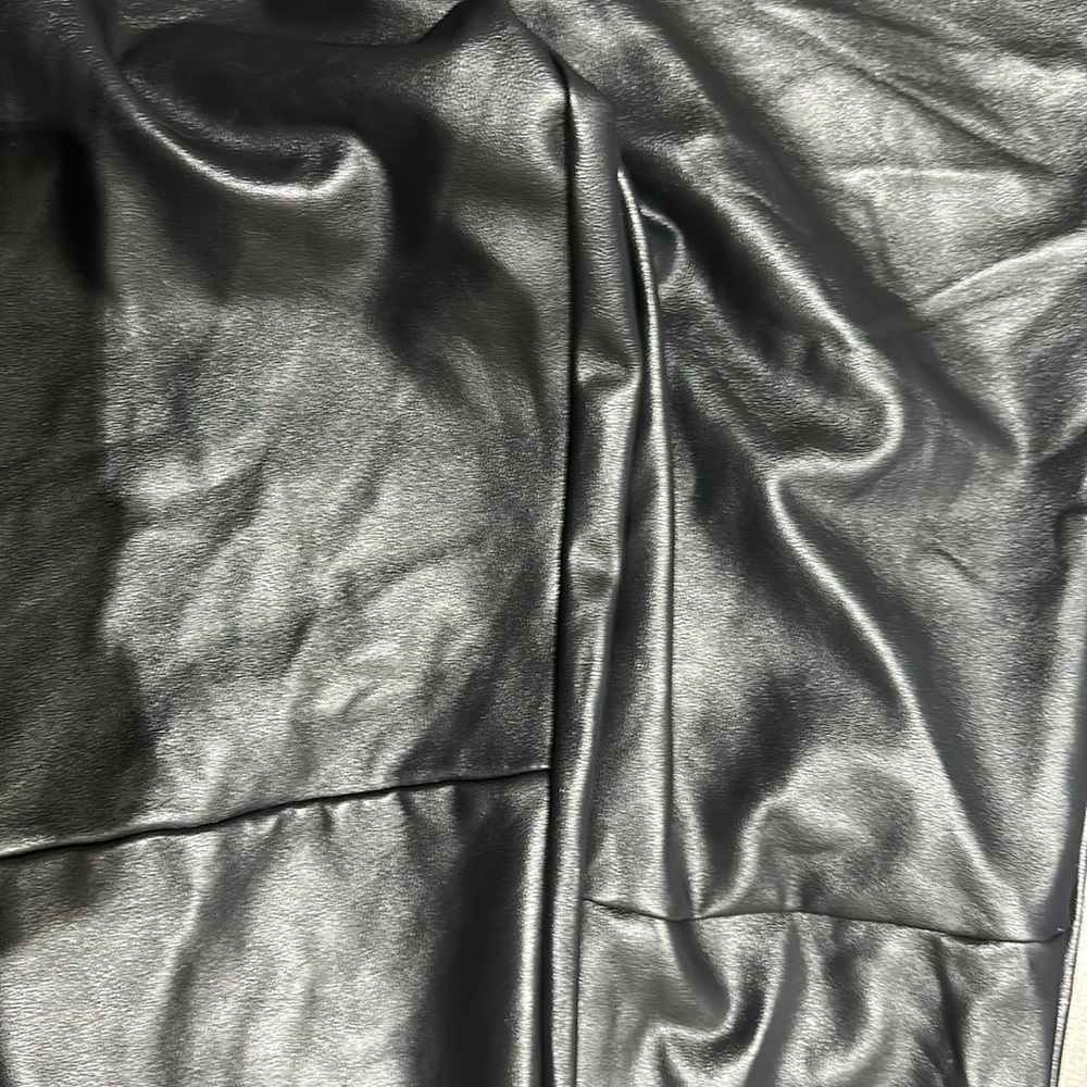 black leather pants never wore